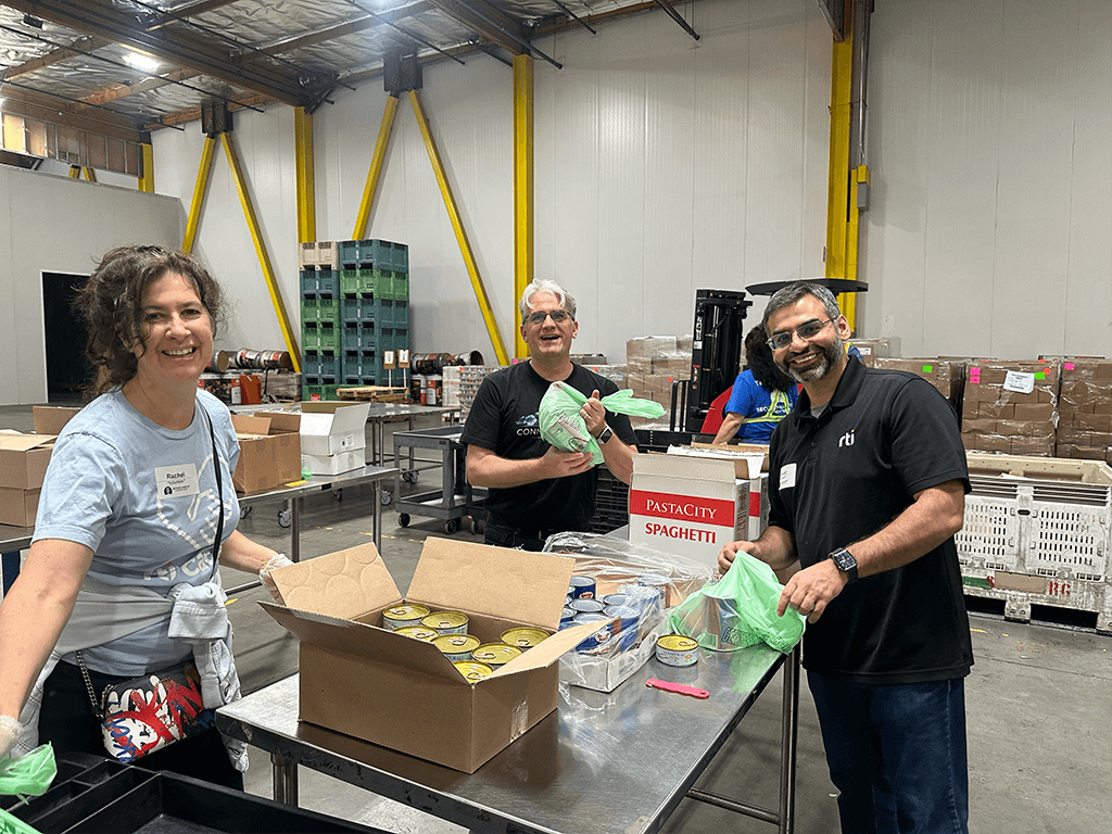 Sorting and boxing fresh produce with Second Harvest of Silicon Valley.