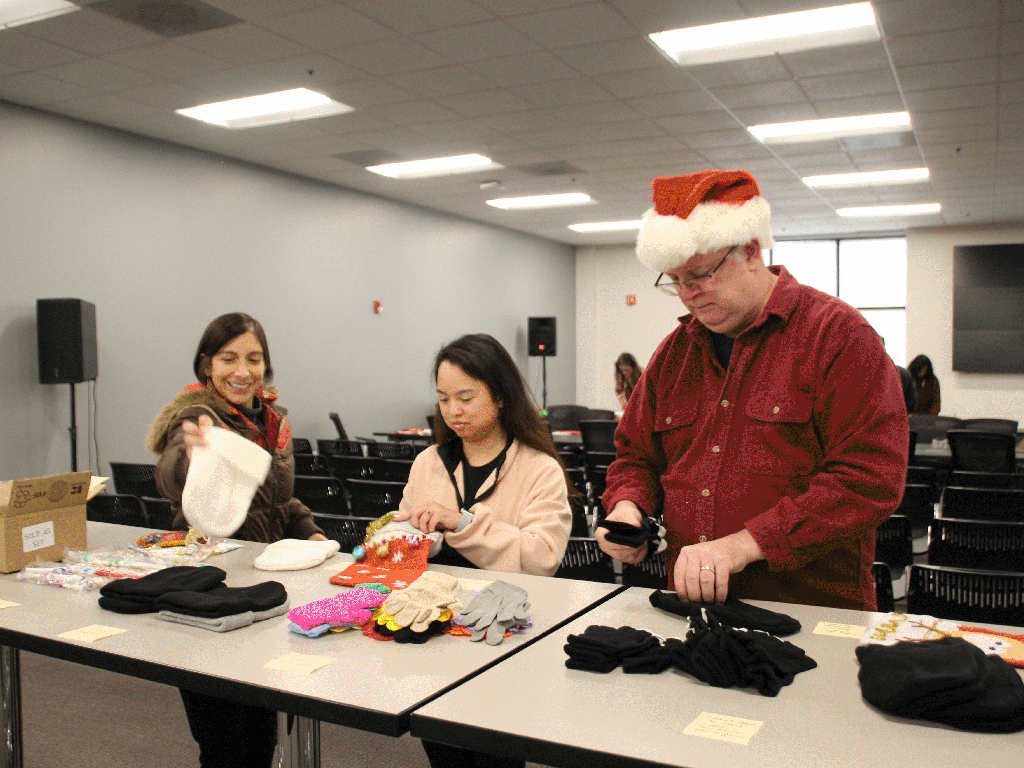 Our HQ employees sorting apparel in stockings for charities in the Bay Area.