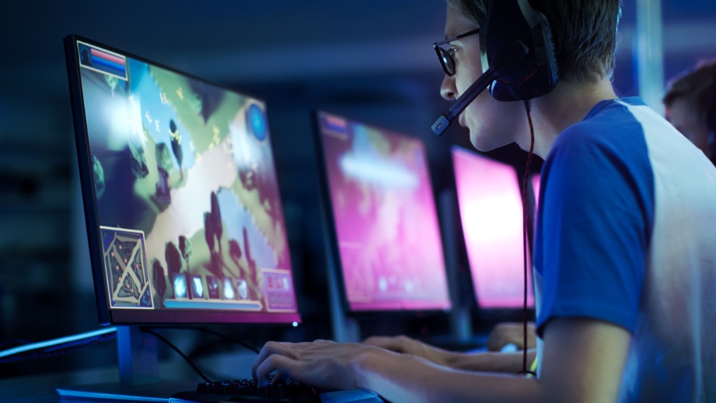 team-of-professional-esport-gamers-playing-in-competitive-mmorpg-picture-id841135958-1